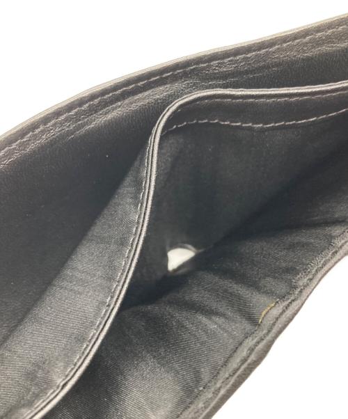 TUMI（トゥミ）TUMI (トゥミ) 2つ折り財布 ブラックの古着・服飾アイテム