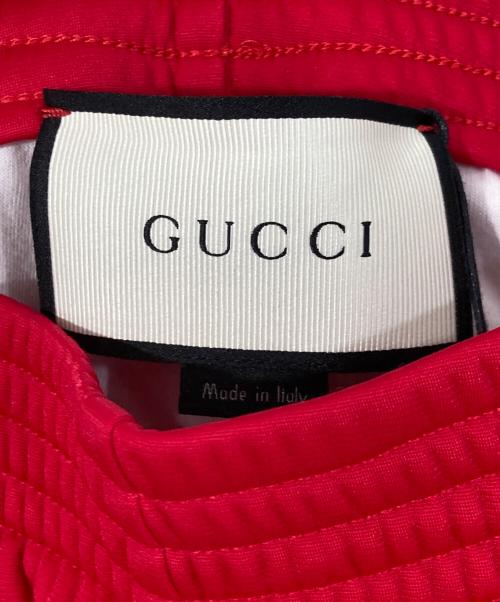 GUCCI（グッチ）GUCCI (グッチ) フラワーエンブロイダリーフレアジャージーパンツ レッド サイズ:XXSの古着・服飾アイテム