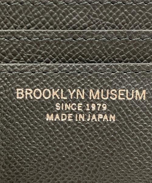 BROOKLYN MUSEUM（ブルックリン ミュージアム）brooklyn museum (ブルックリン ミュージアム) シュリンクレザー ミニスナップウォレット ブラックの古着・服飾アイテム