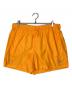NIKE（ナイキ）の古着「Running Team Shorts」｜オレンジ