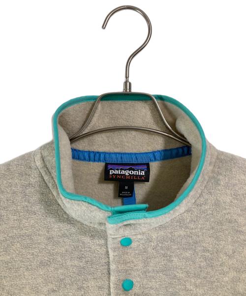 Patagonia SYNCHILLA（パタゴニア シンチラ）Patagonia SYNCHILLA (パタゴニア シンチラ) シンチラ スナップT ベージュ サイズ:Mの古着・服飾アイテム
