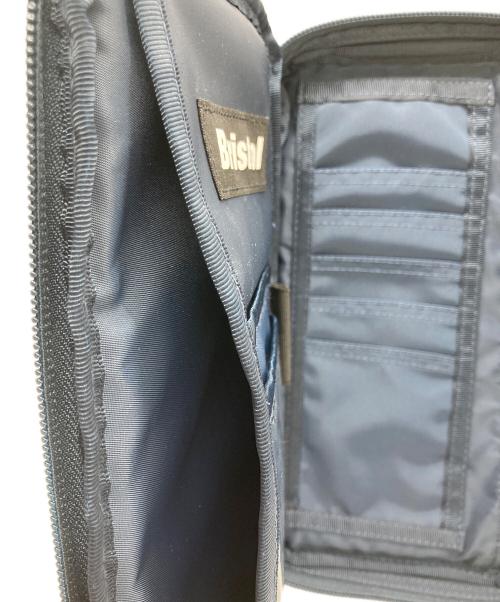 F.C.R.B.（エフシーレアルブリストル）F.C.R.B. (エフシーレアルブリストル) BIG LOGO ORGANISER ネイビーの古着・服飾アイテム