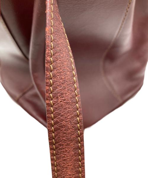 Cartier（カルティエ）Cartier (カルティエ) レザーバケットバッグ ボルドーの古着・服飾アイテム