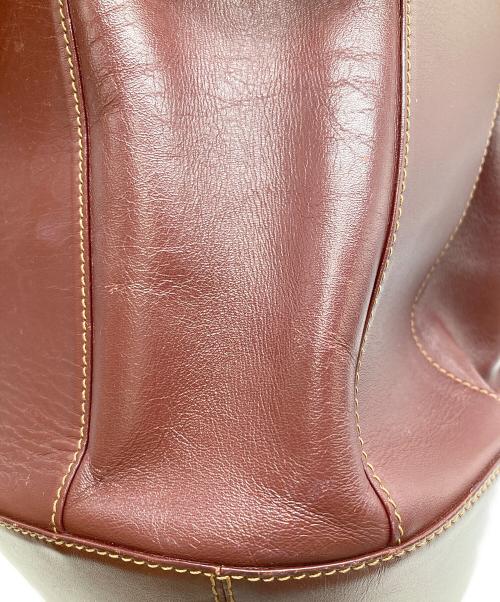 Cartier（カルティエ）Cartier (カルティエ) レザーバケットバッグ ボルドーの古着・服飾アイテム