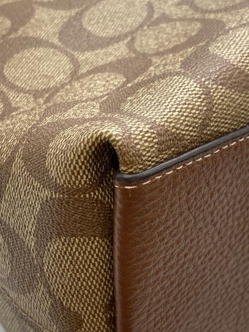 COACH（コーチ）COACH (コーチ) ローガン キャリーオール シグネチャーキャンバス 2WAYバッグ ブラウンの古着・服飾アイテム