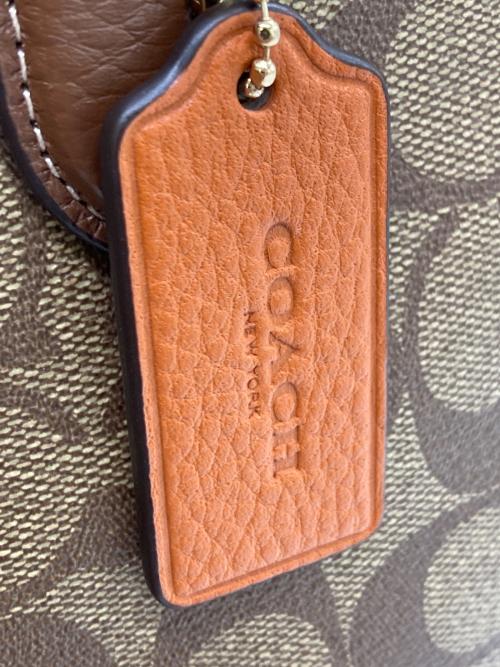COACH（コーチ）COACH (コーチ) ローガン キャリーオール シグネチャーキャンバス 2WAYバッグ ブラウンの古着・服飾アイテム