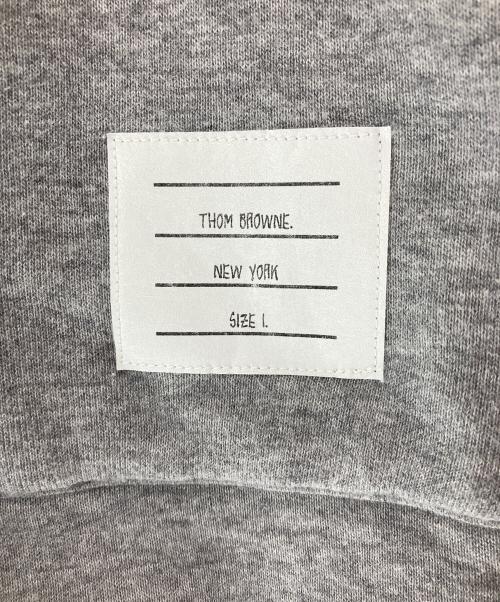 Thom Browne（トムブラウン）Thom Browne (トムブラウン) 4BAR ボタンフーディ- グレー サイズ:Ｌ　の古着・服飾アイテム