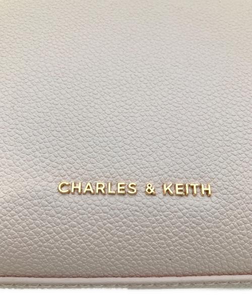 CHARLES & KEITH（チャールズアンドキース）CHARLES & KEITH (チャールズアンドキース) ブリエル クロックエフェクトトップハンドルバッグ ピンクの古着・服飾アイテム