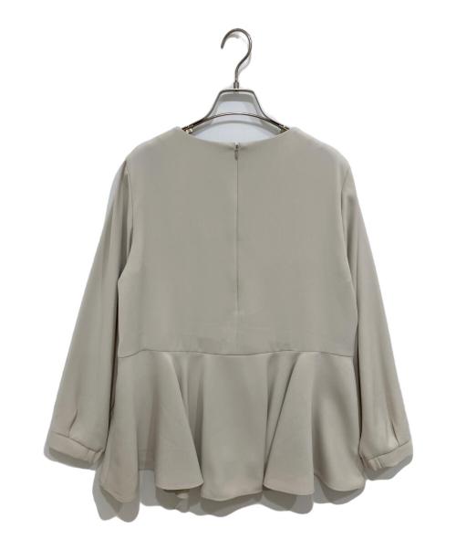 icB（アイシービー）icB (アイシービー) ライトダブルクロスペプラムブラウス ベージュ サイズ:Mの古着・服飾アイテム