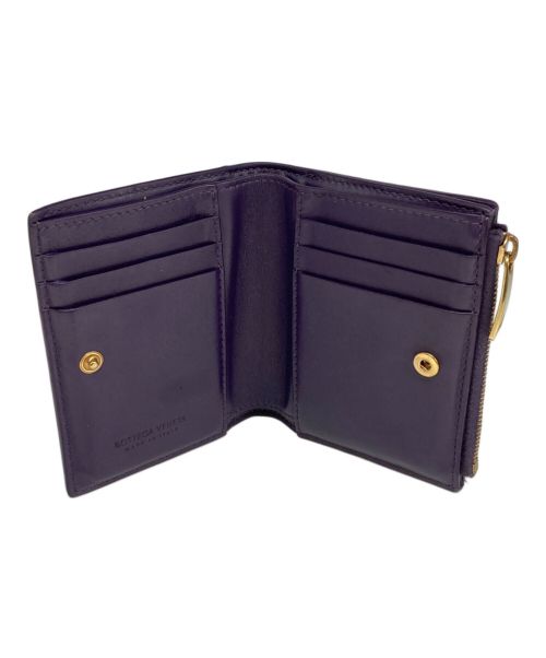 BOTTEGA VENETA（ボッテガベネタ）BOTTEGA VENETA (ボッテガベネタ) スモールカセット二つ折りファスナーウォレット パープルの古着・服飾アイテム