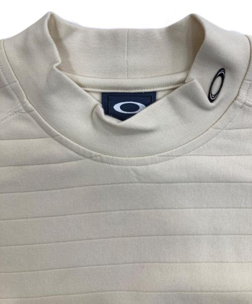 OAKLEY（オークリー）OAKLEY (オークリー) モックネックカットソー ベージュ サイズ:Mの古着・服飾アイテム