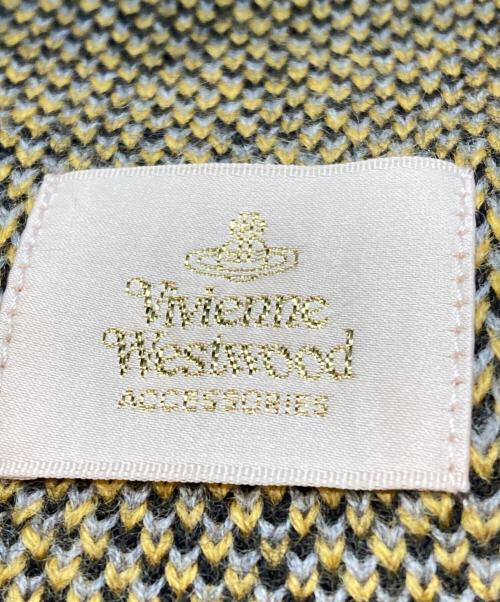 Vivienne Westwood（ヴィヴィアンウエストウッド）Vivienne Westwood (ヴィヴィアンウエストウッド) オーブ&ハートデザインマフラー ブラック×イエローの古着・服飾アイテム