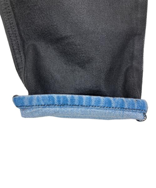 DIESEL（ディーゼル）DIESEL (ディーゼル) 1995-09C85 コーティングデニムパンツ ブラック×インディゴ サイズ:71cm (W28)の古着・服飾アイテム