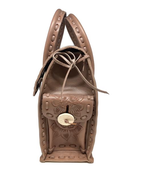 Carving Tribes（カービングトライブス）Carving Tribes (カービングトライブス) カーヴィングレザーハンドバッグ ピンクの古着・服飾アイテム