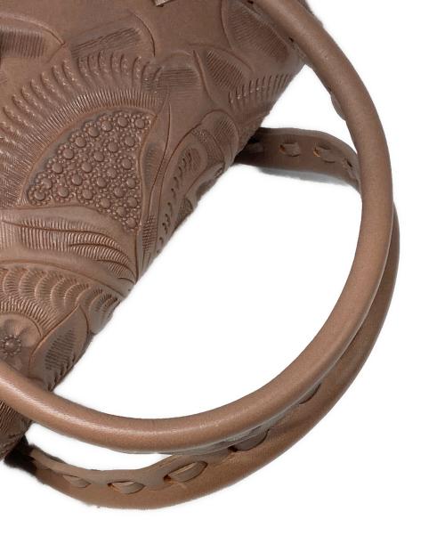 Carving Tribes（カービングトライブス）Carving Tribes (カービングトライブス) カーヴィングレザーハンドバッグ ピンクの古着・服飾アイテム