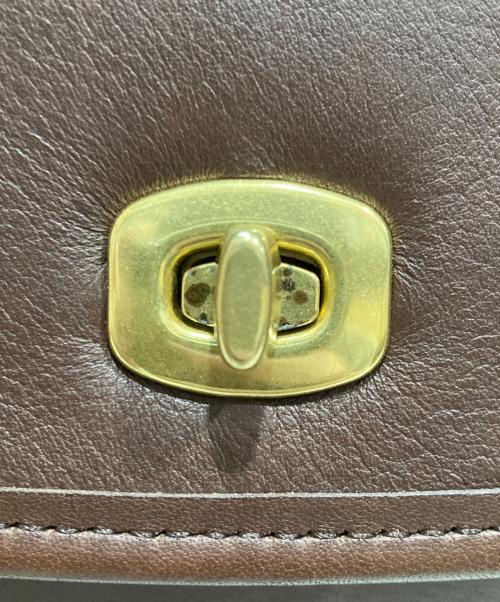 COACH（コーチ）COACH (コーチ) ターンロックブリーフケース ブラウンの古着・服飾アイテム