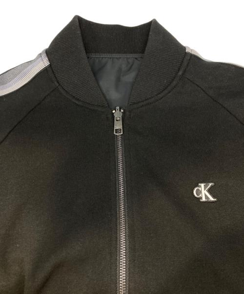 Calvin Klein Jeans（カルバンクラインジーンズ）Calvin Klein Jeans (カルバンクラインジーンズ) サイドラインジップジャケット ブラック サイズ:Mの古着・服飾アイテム