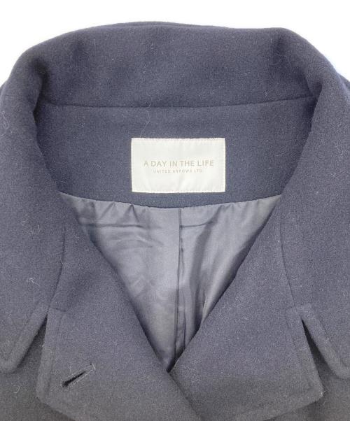 a day in the life（ア デイ イン ザ ライフ）A DAY IN THE LIFE (ア デイ イン ザ ライフ) ニットメルトン スタンドカラーコート ネイビー サイズ:Freeの古着・服飾アイテム