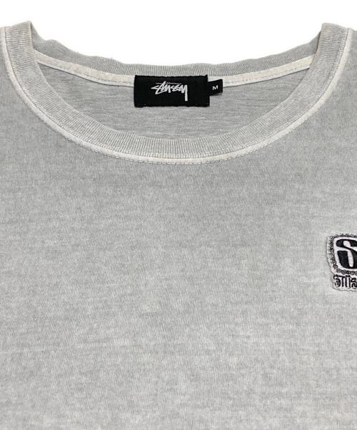 stussy（ステューシー）stussy (ステューシー) ワッペンロゴTシャツ ライトグレー サイズ:Mの古着・服飾アイテム