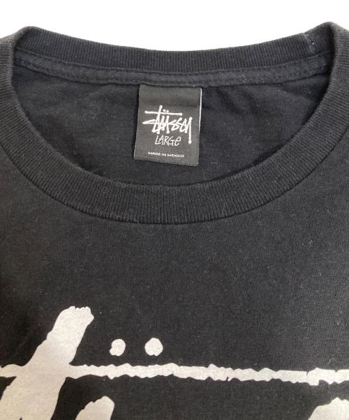 stussy（ステューシー）stussy (ステューシー) kicks/hi (キックスハイ) プリントTシャツ ブラック サイズ:Lの古着・服飾アイテム