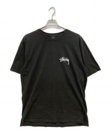 stussy（ステューシー）の古着「HOW WE'RE LIVIN' PIGMENT DYED TEE」｜ブラック