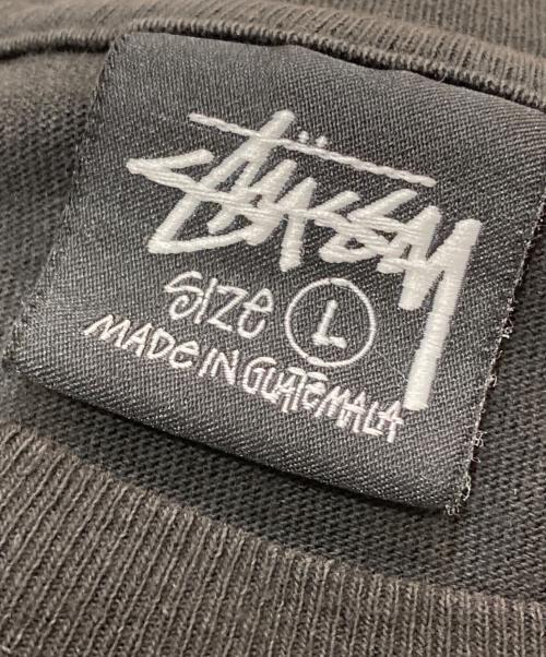 stussy（ステューシー）stussy (ステューシー) HOW WE'RE LIVIN' PIGMENT DYED TEE ブラック サイズ:Lの古着・服飾アイテム
