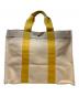 HERMES（エルメス）の古着「トートバッグ」｜ベージュ×イエロー