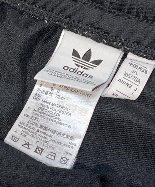 adidas（アディダス）adidas (アディダス) サイドストライプパンツ ブラック サイズ:Lの古着・服飾アイテム