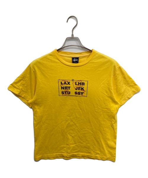 stussy（ステューシー）stussy (ステューシー) AIRPORT CODE TSHIRT/プリントTシャツ イエロー サイズ:Mの古着・服飾アイテム
