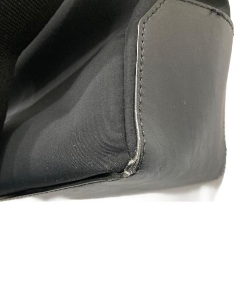 TUMI（トゥミ）TUMI (トゥミ) 「ウッドサイド」イースト・ウエスト・トート ブラックの古着・服飾アイテム