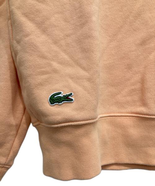 LACOSTE（ラコステ）LACOSTE (ラコステ) ビッグクロックカレッジロゴクルーネックスウェット オレンジ サイズ:S（USサイズ）の古着・服飾アイテム
