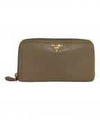 PRADAプラダ）の古着「ラウンドファスナー長財布」｜ベージュ