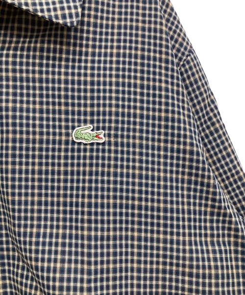 IZOD LACOSTE（アイゾッド ラコステ）IZOD LACOSTE (アイゾッド ラコステ) スイングトップ ネイビー×ベージュ サイズ:105の古着・服飾アイテム