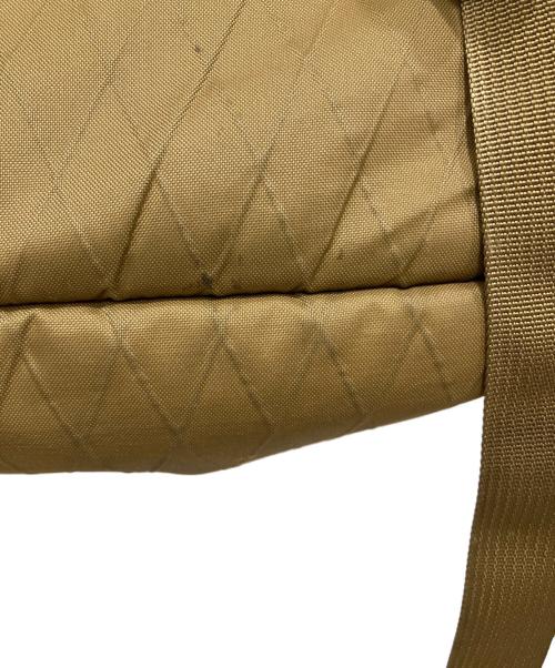 MYSTERY RANCH（ミステリーランチ）MYSTERY RANCH (ミステリーランチ) BOOTY BAG ベージュの古着・服飾アイテム