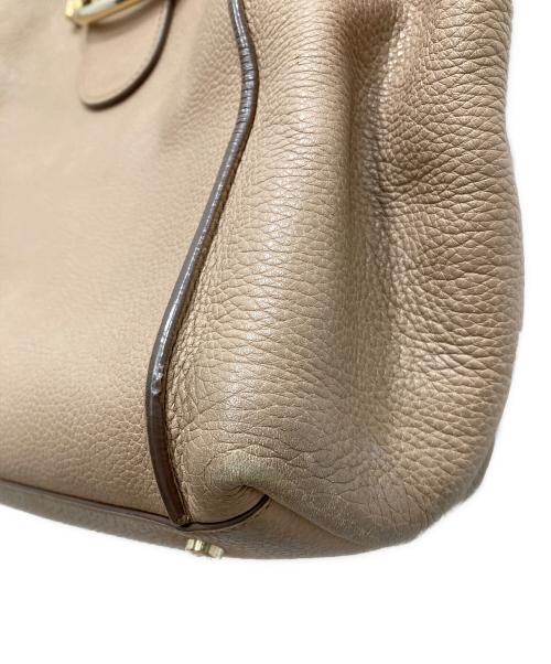 TOD'S（トッズ）TOD'S (トッズ) ダブルTリングトートバッグ ベージュの古着・服飾アイテム