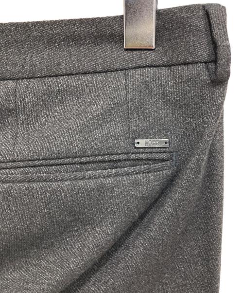 HUGO BOSS（ヒューゴ ボス）HUGO BOSS (ヒューゴ ボス) スラックス グレー サイズ:Mの古着・服飾アイテム