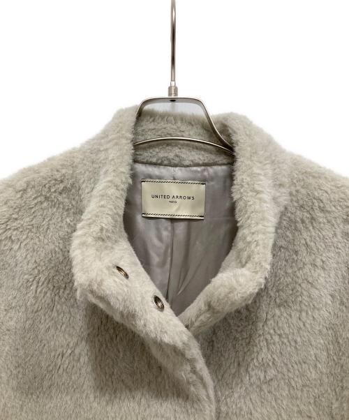 UNITED ARROWS TOKYO（ユナイテッドアローズトウキョウ）UNITED ARROWS TOKYO (ユナイテッドアローズトウキョウ) フェイクファー ミドル コート アイボリー サイズ:38の古着・服飾アイテム
