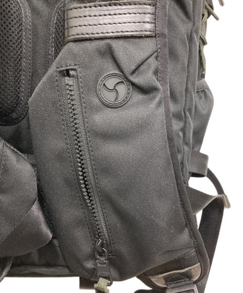 ASSOV（アッソブ）assov (アッソブ) CORDURA DOBBY 305D ROUND ZIP BACK PACK ブラックの古着・服飾アイテム