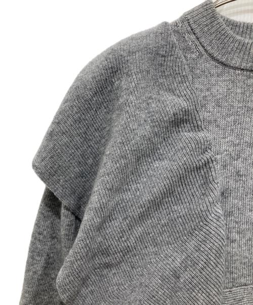 ELENDEEK（エレンディーク）ELENDEEK (エレンディーク) ショルダーフリルペプラムニット グレー サイズ:Fの古着・服飾アイテム