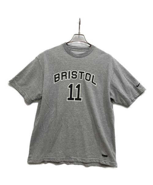 NIKE（ナイキ）NIKE (ナイキ) F.C.R.B. (エフシーレアルブリストル) プリントTシャツ グレー サイズ:Mの古着・服飾アイテム