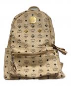 MCMエムシーエム）の古着「ヴィセトスロゴグラムスタッズリュック/総柄リュック」｜ベージュ