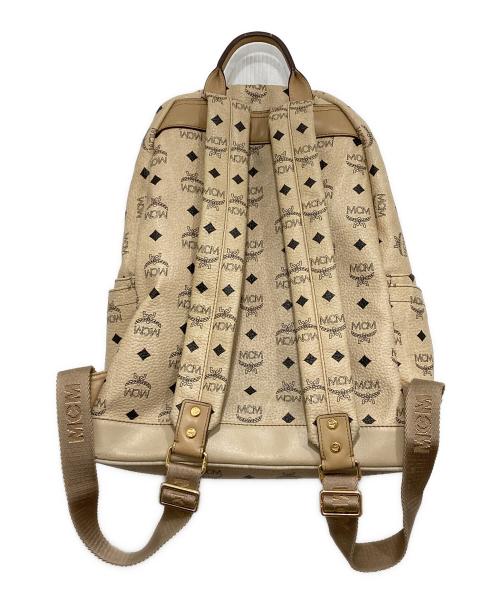 MCM（エムシーエム）MCM (エムシーエム) ヴィセトスロゴグラムスタッズリュック/総柄リュック ベージュの古着・服飾アイテム