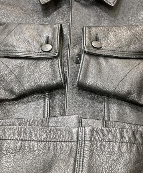 Carhartt WIP（カーハート ワークインプログレス）CARHARTT WIP (カーハート ワークインプログレス) LEATHER CHORE COAT ブラック サイズ:Mの古着・服飾アイテム