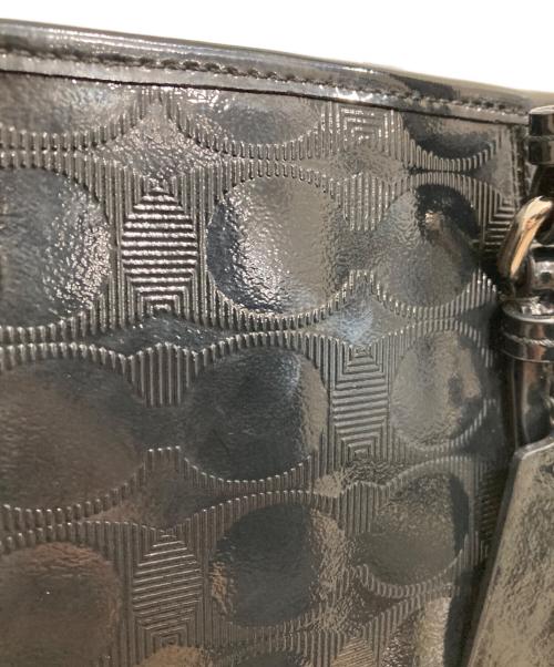 COACH（コーチ）COACH (コーチ) エナメルスグネチャートートバッグ ブラックの古着・服飾アイテム