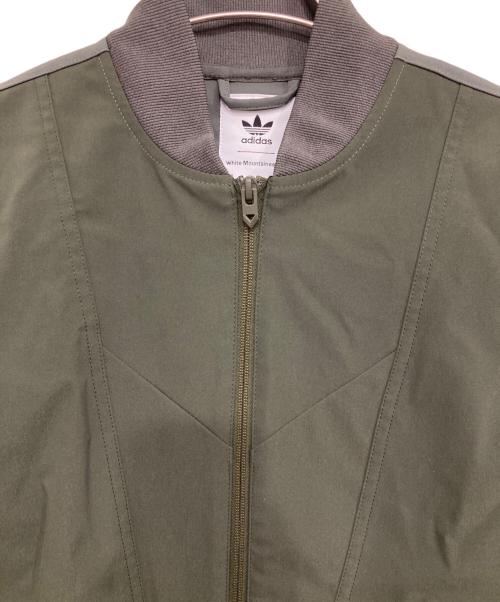 adidas（アディダス）adidas (アディダス) WHITE MOUNTAINEERING (ホワイトマウンテ二アニング) WHITE MOUNTAINEERING/ジップアップジャケット グリーン サイズ:Sの古着・服飾アイテム