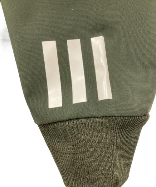 adidas（アディダス）adidas (アディダス) WHITE MOUNTAINEERING (ホワイトマウンテ二アニング) WHITE MOUNTAINEERING/ジップアップジャケット グリーン サイズ:Sの古着・服飾アイテム