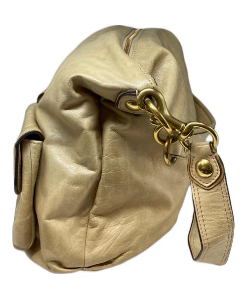 COACH（コーチ）COACH (コーチ) ターンロック2WAYバッグ ベージュの古着・服飾アイテム