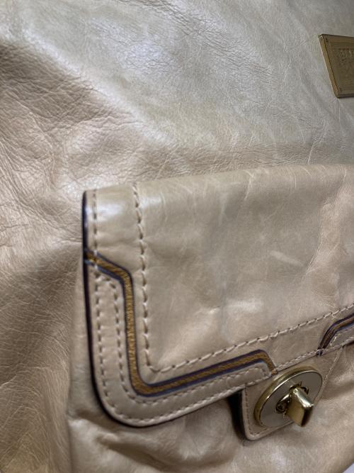 COACH（コーチ）COACH (コーチ) ターンロック2WAYバッグ ベージュの古着・服飾アイテム