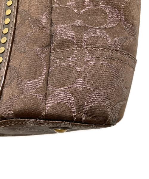COACH（コーチ）COACH (コーチ) シグネチャースタッズトートバッグ ブラウンの古着・服飾アイテム