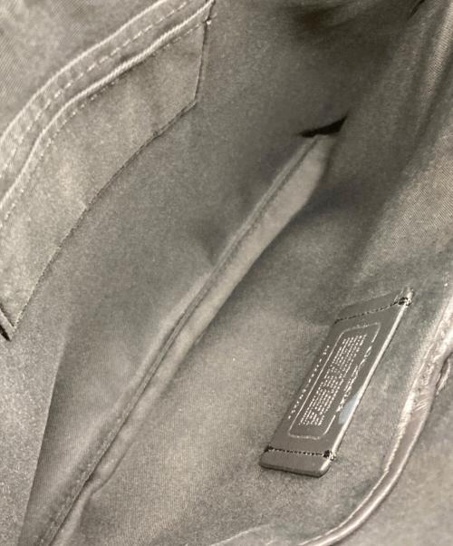 COACH（コーチ）COACH (コーチ) シグネチャー柄クラッチバッグ ブラックの古着・服飾アイテム